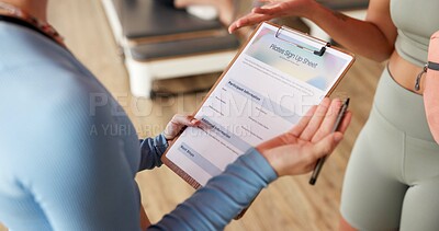 Buy stock photo Fitness, hands and clipboard for sign up with pilates membership, details and registration. Women, client and personal trainer with paperwork at health club for application, workout contract or form