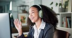 Happy woman, headphones and wave with video call for communication or online meeting in office. Female person, consultant or agent with smile for webinar, discussion or conversation in workplace