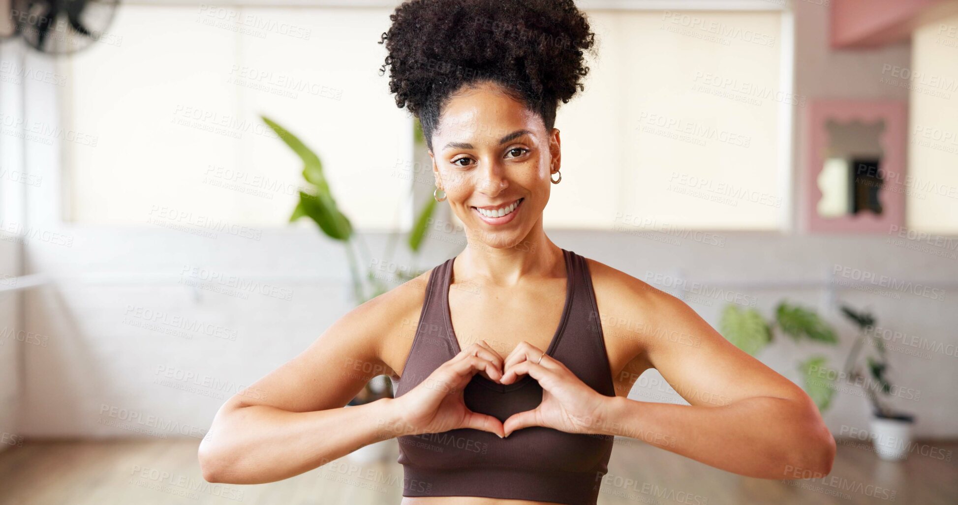 Buy stock photo Fitness, portrait or black woman in studio with heart hands, appreciation or body positivity in wellness routine. Smile, exercise or athlete in gym with emoji, self love or support for progress goal.