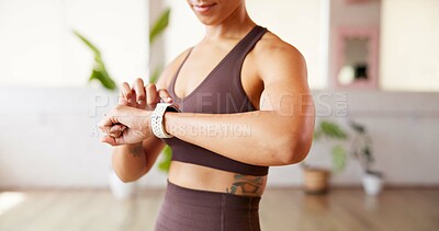 Buy stock photo Hands, woman and check smart watch for fitness, performance tracking or health information. Exercise, person and wristwatch for timer, workout progress or heartbeat monitor for wellness in studio