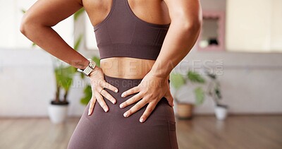 Buy stock photo Hands, back pain and woman in studio, fitness and stretching with muscle fatigue. Burnout, exercise and person in health club, pilates and inflammation with joint injury, accident and osteoporosis
