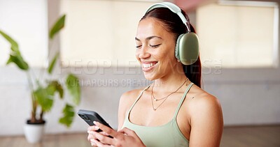 Buy stock photo Phone, smile and headphones with woman in yoga class for podcast with online app. Fitness, gym audio and female person with technology for networking, contact and social media in pilates studio