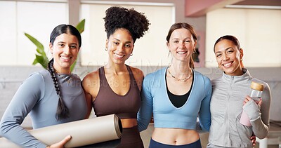 Buy stock photo Portrait, personal trainer or group of women in studio for fitness support, pride or wellness training. Happy people, confident or yogi with mat in club, mobility exercise or water bottle for join us