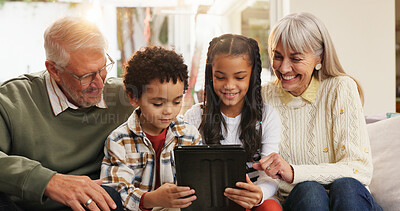 Buy stock photo Tablet, relax and grandparents with children on sofa in home for watching movie, series or show. Happy, digital technology and senior people with kids for streaming film together in living room.