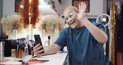 Buy stock photo Person, video call and drag artist in dressing room with smile for performance, cabaret or show. Talent, beauty and lgbt performer at club for cosmetics, wave hello and mobile app for chat at theater