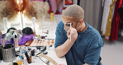 Buy stock photo Drag performer, cosmetic brush or mirror in dressing room for getting ready, queer culture or application. Stage makeup, person prepare or artist fill eyebrows backstage, transformation or high angle