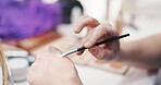Person, hands and makeup brush with color for skin tone, texture or cosmetic styling in studio. Closeup, artist or stylist testing product with foundation for contour, concealer or beauty blending