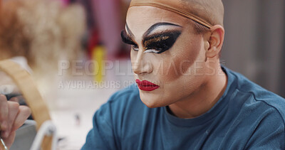Buy stock photo Person, makeup and drag artist in dressing room with application for production, cabaret or show. Talent, beauty and lgbt performer at club with cosmetics, process and prepare for concert at theater