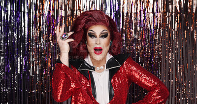 Buy stock photo Portrait, drag artist and pride at streamers with makeup for transformation, beauty and creative show. LGBTQ, person and face art for gender exploration, performance and alter ego on curtain backdrop