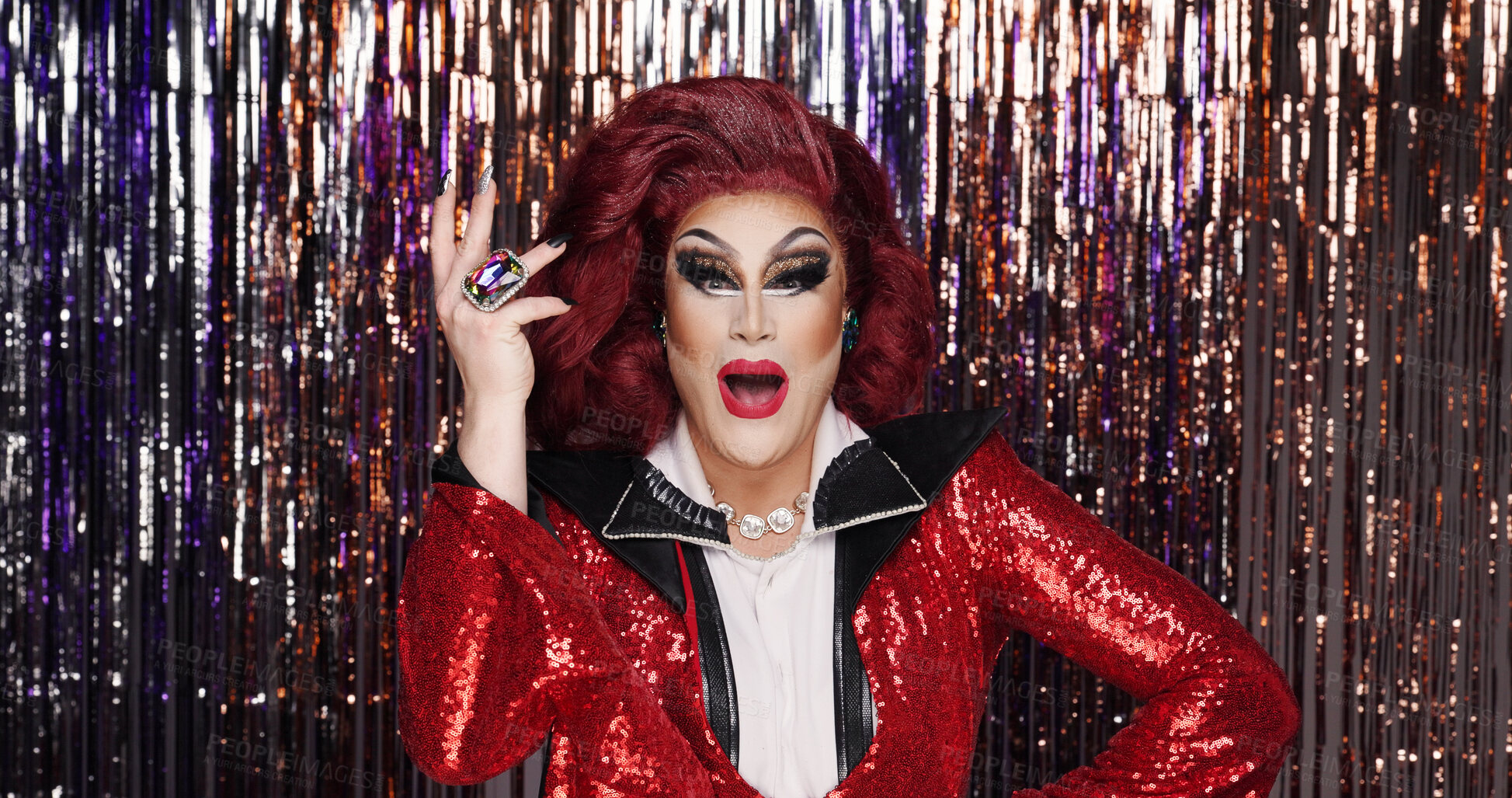 Buy stock photo Portrait, drag artist and pride at streamers with makeup for transformation, beauty and creative show. LGBTQ, person and face art for gender exploration, performance and alter ego on curtain backdrop