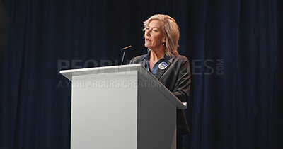 Buy stock photo Election, politician or woman at podium with mic, democratic process or candidate speech at debate. Campaign message, persuasion or mature person with call to action, voter trust or public engagement