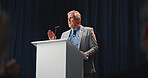 Announcement, politician and man with speech, press conference or podium with activism. Seminar, mature person or speaker with official event, vote or legislator with policy update and politics
