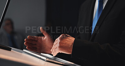 Buy stock photo Politics, presentation and hands at podium with tablet, campaign or PR speech for election. Press conference, dark and ambassador in auditorium with tech, address or public relations for government.