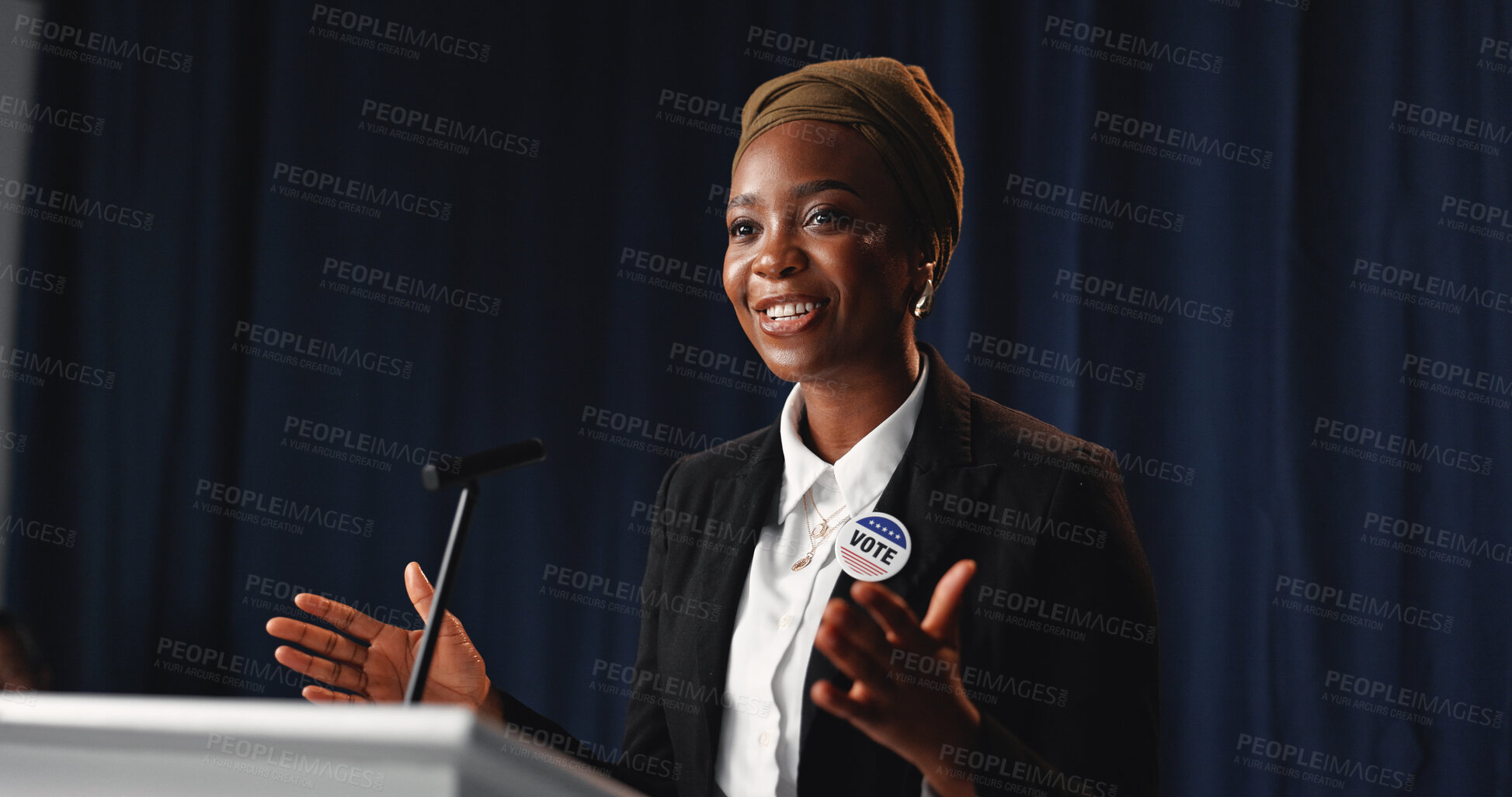 Buy stock photo Black woman, podium and political speech at convention for democracy, press conference and election campaign. Politician, talking and vote badge for government, public announcement and media debrief