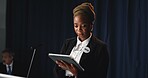 Podium, politician and woman on tablet for speech notes, election debate and prepare on stage. Government, candidate and person on digital tech for press conference agenda, voting stats and planning