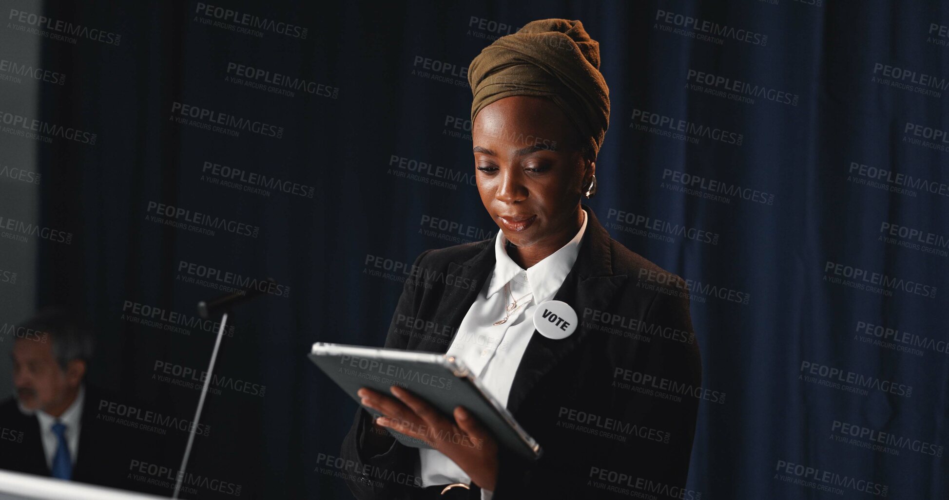 Buy stock photo Podium, politician and woman on tablet for speech notes, election debate and prepare on stage. Government, candidate and person on digital tech for press conference agenda, voting stats and planning
