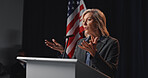 Politician, speech and woman with American flag by podium for election, debate and voting campaign. Government speaker, candidate and person on stage for press conference, political policy and rally