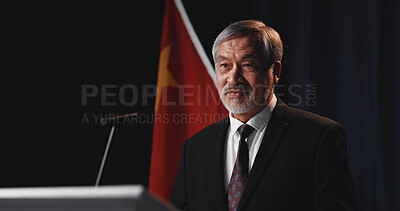 Buy stock photo Speech, politician and man with announcement, podium and stage for election, public speaking and pride. Mature person, presentation and speaker with feedback, democracy and convention in Vietnam
