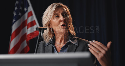 Buy stock photo Politician, speaker and woman with American flag on a stage for election, debate or voting campaign. Government, candidate and mature person for press conference, political rally and speech by podium
