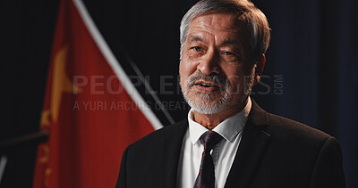 Buy stock photo Speech, politician and man with announcement, talking and stage for election, public speaking and event. Mature person, presentation and speaker with feedback, democracy and conference in Vietnam