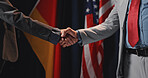 People, american flag and handshake with agreement for political negotiation, deal or election. Politician, congressmen or shaking hands with global partnership for ceasefire, exchange or truce