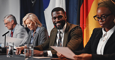 Buy stock photo Press conference, politics and happy man with government delegation or international panel. Summit, people and portrait of politician with group at event for diplomacy, global forum or policy expo