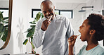 Teaching, brushing teeth and father with child in bathroom in home for dental care, hygiene or wellness. Learning, oral health and African dad with boy kid for mouth routine in morning together.