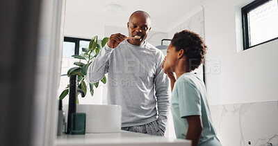 Buy stock photo Black family, kid and brushing teeth with father in home for hygiene, fresh breath and demonstration. Man, how to and child for cleaning mouth, dental habit or oral care to prevent cavity in bathroom