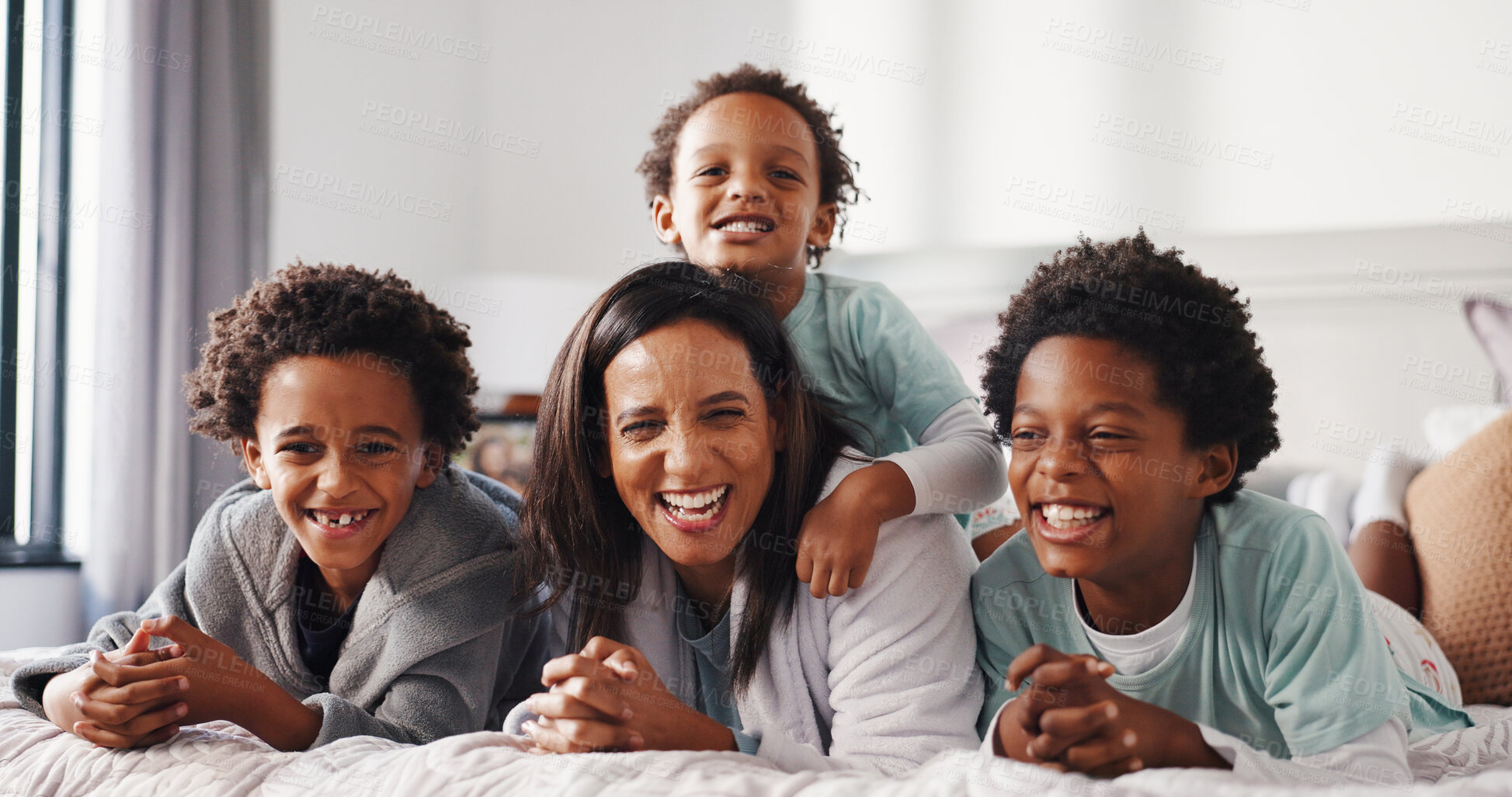 Buy stock photo Portrait, mother and kids in bedroom with laughing, love or brothers bonding together. African family, children and single parent on bed of home for funny humor, happiness or connection in morning
