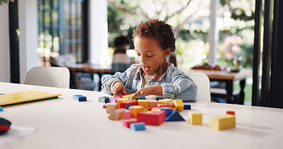 Buy stock photo Learning, kid or game with building blocks in home for fine motor skills, problem solving or creativity. Education, african boy and wooden toys for sensory play, cognitive development or coordination
