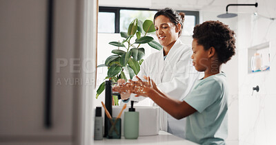 Buy stock photo Washing hands, child and mother in bathroom for hygiene, learning and bacteria safety. Parent, boy and soap by sink in home for germ prevention, health and cleaning with happy family together