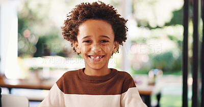 Buy stock photo Portrait, smile and kid in home for development, growth or relax on weekend break in living room. Cute African boy, house and happy child with peace, calm or positive attitude in apartment with bokeh