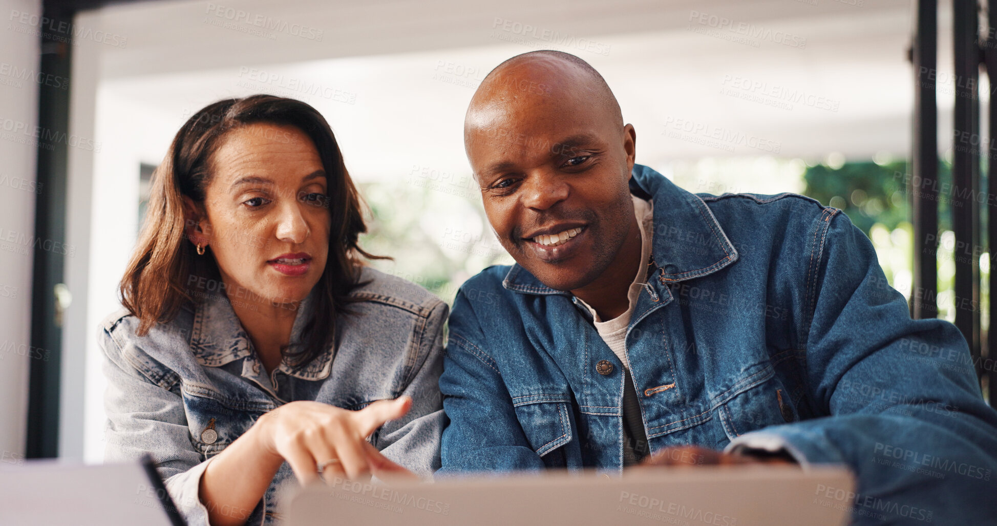 Buy stock photo Happy, couple and pointing to laptop at house for finance planning, review budget and application. Black people, talking and pc for mortgage, financial loan and asset management of investment report