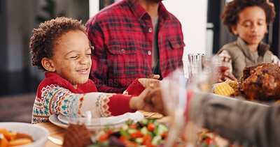 Buy stock photo Christmas, prayer and family with food, boy and holding hands with tradition, unity and faith. Home, parents and mother with father, kids and Xmas meal with gratitude, worship and respect with feast