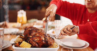 Buy stock photo Person, hands and christmas with chicken on dinner table for meal, dishing or gathering in home. Cutting, dinning and people with roast, vegetables or food for event, festive feast or celebration