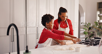 Buy stock photo Learning, mother and child with baking in kitchen for holiday cookies, teaching recipe and help. African family, woman or kid with rolling pin in home for dough preparation, weekend snacks or bonding