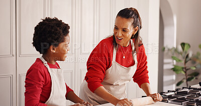 Buy stock photo Learning, mother and kid with baking in kitchen for holiday cookies, teaching recipe and help. African family, woman or child with rolling pin in home for dough preparation, weekend snacks or bonding