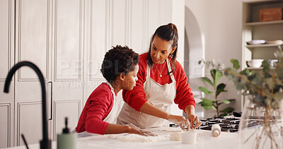 Buy stock photo Learning, mother and child with baking in home for holiday cookies, teaching recipe or help. African family, woman or kid with instructions in kitchen for dough preparation, weekend snacks or bonding