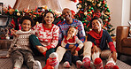 Family, laugh and portrait for Christmas, home and picture on December holiday, bonding and together. Interracial, man and woman with children on Xmas, celebration and photography for festive season