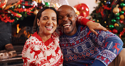 Buy stock photo Happy couple, portrait or hug with christmas tree in home for festive celebration or holiday. Interracial, man and woman with smile, embrace or laughing for december tradition or romance in house