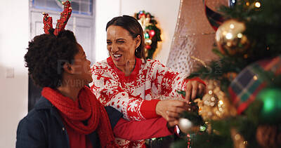Buy stock photo Christmas tree, ornament and mother with child in home for holiday, festive tradition and bonding. Family, love and happy mom with boy, bauble and celebration for December and xmas decoration