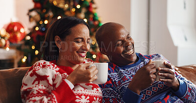 Buy stock photo Coffee, christmas and couple on sofa in home with bonding, connection or marriage in living room. Happy, love and man with woman for drinking eggnog for festive weekend with xmas tradition in house.