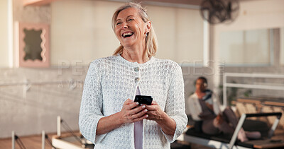 Buy stock photo Pilates class, woman and laughing with phone in studio for social media meme, funny post and break. Fitness, mature person and happy with smartphone at wellness club for comic video and texting joke