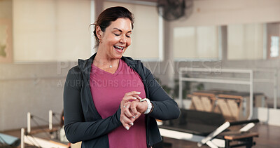 Buy stock photo Check, smart watch and mature woman in gym, fitness and tracking workout progress on app and online. Health club, info and person with exercise goals, wellness and monitor heart rate with technology