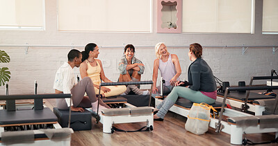 Buy stock photo Woman, friends and happy with talk at pilates class, listen and laugh with conversation at gym. People, group and smile with memory, chat or funny story for bonding, fitness and wellness at club