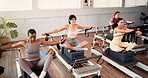 Women, reformer and stretching with resistance machine for flexibility, exercise or pilates class. Active, female people or group with fitness equipment for arm workout, balance or training in gym