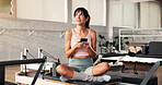 Thinking, cellphone and woman in studio, exercise and typing with digital app to track progress. Contemplation, relax or healthy person in wellness center, smartphone and social media with connection