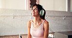 Happy, thinking and woman with headphones, fitness and podcast for motivation, relax and sound. Mature person, exercise or smile with break, playlist album or radio with workout or listening to music