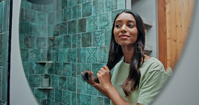 Buy stock photo Beauty, hairbrush and mirror with woman in bathroom of home for getting ready or morning routine. Brushing hair, reflection and smile of happy Indian person in apartment for daily haircare treatment
