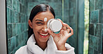 Beauty, cream and portrait with woman in bathroom for morning routine, retinol moisturizer and self care. Dermatology, lotion and skincare with person in home for hydration, glow and facial treatment